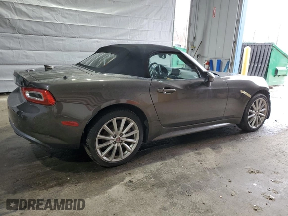 2017 FIAT 124 Spider Elaborazione Abarth z VIN JC1NFAEK1H0125019, wystawiony jako Copart lot #51663565 z przebiegiem Nie podano mil oraz Szkoda całkowita • Salvage title. Historia ofert i sprzedaży dostępna na DreamBid. Obrazek 3.