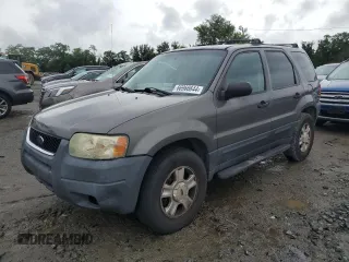 2003 Ford Escape XLT Popular 2 with VIN 1FMYU93163KE03257, listed as a Copart auction lot 66966644 with 209,618 mi miles and Salvage Title. Bid and sale history available at carsss.com. Image 1.