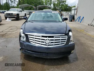 2008 Cadillac DTS 1SC z VIN 1G6KD57Y88U174251, wystawiony jako Copart lot #53309195 z przebiegiem 71 103 mil mil oraz Szkody całkowita. Historia ofert i sprzedaży dostępna na DreamBid. Obrazek 5.