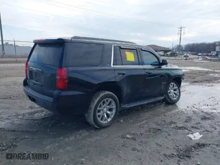 2016 Chevrolet Tahoe LT with VIN 1GNSKBKC8GR367215, listed as a IAAI auction lot 41702352 with 106,434 mi miles. Bid and sale history available at carsss.com. Image 4.