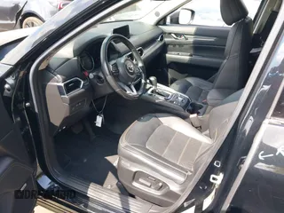 2020 Mazda CX-5 Grand Touring with VIN JM3KFADM3L1819939, listed as a IAAI auction lot 42749920 with 35,407 mi miles and . Bid and sale history available at DreamBid. Image 18.