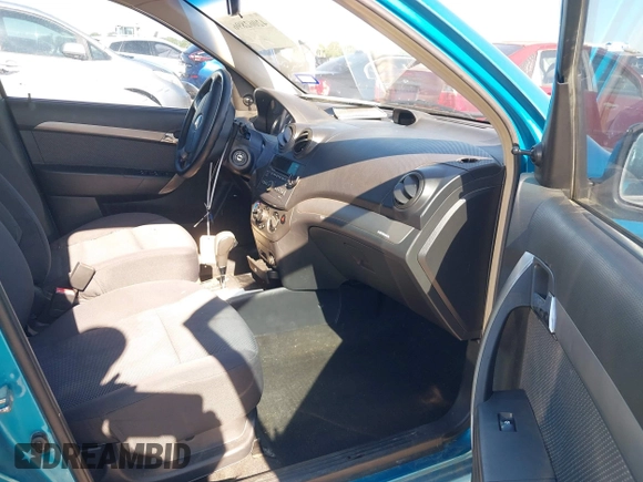 2009 Chevrolet Aveo 1LT z VIN KL1TD56E39B645672, wystawiony jako IAAI lot #42062896 z przebiegiem 131 927 mil mil oraz . Historia ofert i sprzedaży dostępna na DreamBid. Obrazek 5.