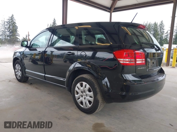2013 Dodge Journey American Value with VIN 3C4PDCABXDT671589, listed as a IAAI auction lot 42260837 with 154,214 mi miles and . Bid and sale history available at DreamBid. Image 3.