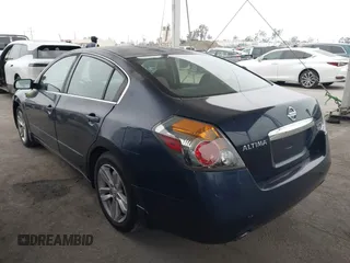 2012 Nissan Altima 3.5 SR with VIN 1N4BL2AP7CC148890, listed as a IAAI auction lot 42100882 with 127,503 mi miles. Bid and sale history available at carsss.com. Image 3.