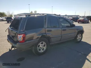 1999 Jeep Grand Cherokee Laredo with VIN 1J4GW58SXXC786179, listed as a Copart auction lot 79774564 with 272,192 mi miles and Salvage Title. Bid and sale history available at carsss.com. Image 3.