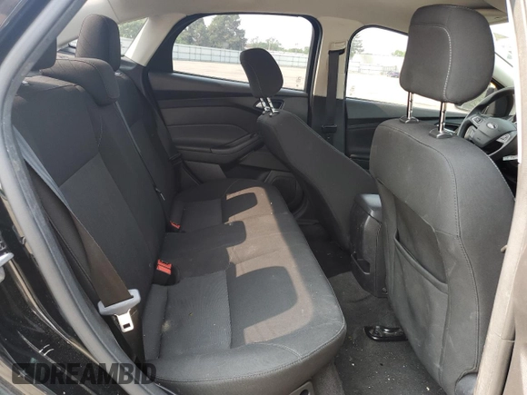 2018 Ford Focus SE z VIN 1FADP3F2XJL228407, wystawiony jako Copart lot #59254415 z przebiegiem 75 241 mil mil oraz Szkoda całkowita • Salvage title. Historia ofert i sprzedaży dostępna na DreamBid. Obrazek 10.