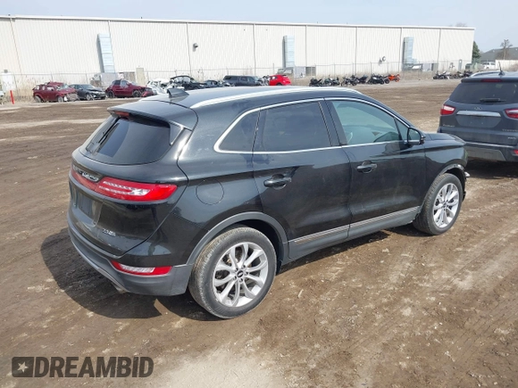 2015 Lincoln MKC with VIN 5LMTJ2AH0FUJ04461, listed as a IAAI auction lot 41804169 with 97,187 mi miles. Bid and sale history available at carsss.com. Image 4.
