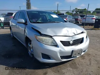 2009 Toyota Corolla with VIN JTDBL40E099056371, listed as a IAAI auction lot 42132122 with 204,016 mi miles and . Bid and sale history available at DreamBid. Image 1.