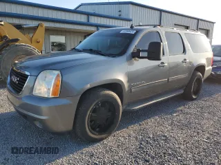 2012 GMC Yukon XL SLT z VIN 1GKS2KE72CR219552, wystawiony jako Copart lot #52360425 z przebiegiem 144 674 mil mil oraz Szkoda całkowita • Salvage title. Historia ofert i sprzedaży dostępna na DreamBid. Obrazek 1.
