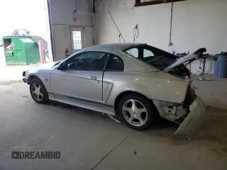 2001 Ford Mustang Standard с VIN 1FAFP40441F187456, выставлен на аукционе Copart как лот 53296415 с пробегом 215 719 миль миль и Списание • Salvage title. История ставок и продаж доступна на DreamBid. Изображение 2.