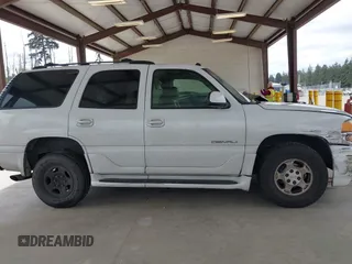 2004 GMC Yukon Denali z VIN 1GKEK63U84J148225, wystawiony jako IAAI lot #42218451 z przebiegiem 296 149 mil mil oraz . Historia ofert i sprzedaży dostępna na DreamBid. Obrazek 13.