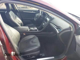 2017 Ford Fusion Titanium z VIN 3FA6P0K94HR271307, wystawiony jako IAAI lot #42595411 z przebiegiem 100 344 mil mil oraz . Historia ofert i sprzedaży dostępna na DreamBid. Obrazek 5.