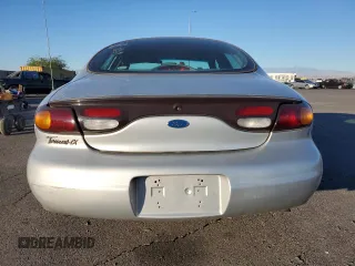 1996 Ford Taurus LX with VIN 1FALP53S9TG173438, listed as a Copart auction lot 77232114 with 89,789 mi miles and Clean title. Bid and sale history available at DreamBid. Image 6.