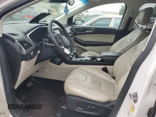 2015 Ford Edge Titanium z VIN 2FMPK4K88FBC05216, wystawiony jako Copart lot #56523475 z przebiegiem 156 558 mil mil oraz Szkoda całkowita • Salvage title. Historia ofert i sprzedaży dostępna na DreamBid. Obrazek 7.