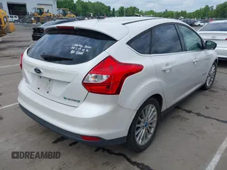 2013 Ford Focus Electric z VIN 1FADP3R46DL133781, wystawiony jako IAAI lot #42129143 z przebiegiem 114 041 mil mil oraz . Historia ofert i sprzedaży dostępna na DreamBid. Obrazek 4.
