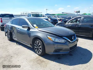 2018 Nissan Altima 2.5 SV with VIN 1N4AL3AP1JC102695, listed as a IAAI auction lot 40440992 with 58,063 mi miles. Bid and sale history available at carsss.com. Image 1.