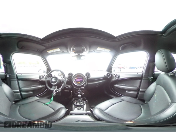 2015 MINI Countryman S with VIN WMWZC5C58FWP46931, listed as a Copart auction lot 59183495 with 105,731 mi miles and Salvage title. Bid and sale history available at DreamBid. Image 14.