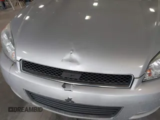 2014 Chevrolet Impala LS z VIN 2G1WA5E35E1177364, wystawiony jako IAAI lot #42343359 z przebiegiem 102 093 mil mil oraz . Historia ofert i sprzedaży dostępna na DreamBid. Obrazek 6.