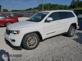 2019 Jeep Grand Cherokee Laredo E with VIN 1C4RJEAG2KC732645, listed as a Copart auction lot 53336495 with 76,221 mi miles and Salvage title. Bid and sale history available at DreamBid. Image 1.
