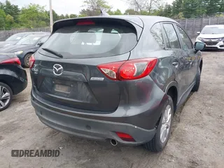 2016 Mazda CX-5 Sport with VIN JM3KE4BY9G0710004, listed as a IAAI auction lot 42323434 with 83,320 mi miles and . Bid and sale history available at DreamBid. Image 4.