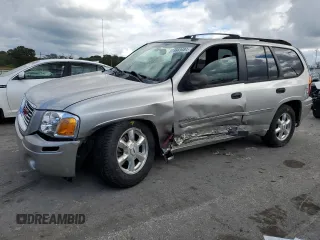 2006 GMC Envoy SLE with VIN 1GKDT13S462228967, listed as a Copart auction lot 73669484 with 233,349 mi miles and Salvage Title. Bid and sale history available at DreamBid. Image 1.