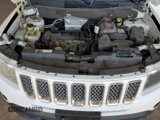 2016 Jeep Compass Latitude z VIN 1C4NJCEAXGD633548, wystawiony jako Copart lot #59866875 z przebiegiem 193 695 mil mil oraz Szkoda całkowita • Salvage title. Historia ofert i sprzedaży dostępna na DreamBid. Obrazek 12.
