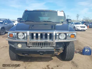 2005 Hummer H2 SUV with VIN 5GRGN23U05H128420, listed as a IAAI auction lot 41983395 with 194,925 mi miles. Bid and sale history available at carsss.com. Image 13.