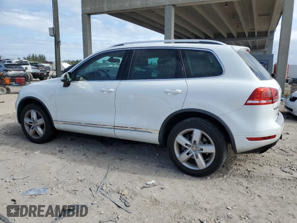 2012 Volkswagen Touareg Exec with VIN WVGEF9BP1CD008717, listed as a Copart auction lot 86095164 with 211,089 mi miles and Clean Title. Bid and sale history available at DreamBid. Image 2.