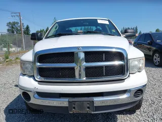 2005 Dodge 2500 SLT z VIN 3D7KS28CX5G853026, wystawiony jako IAAI lot #42408623 z przebiegiem 241 223 mil mil oraz . Historia ofert i sprzedaży dostępna na DreamBid. Obrazek 13.