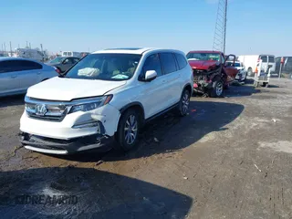 2021 Honda Pilot EX-L with VIN 5FNYF5H57MB037861, listed as a IAAI auction lot 41566924 with 42,867 mi miles. Bid and sale history available at carsss.com. Image 17.