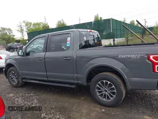 2018 Ford F-150 XL with VIN 1FTEW1EPXJFC85210, listed as a IAAI auction lot 42150759 with 97,660 mi miles and . Bid and sale history available at carsss.com. Image 14.