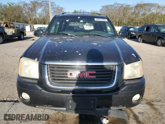 2004 GMC Envoy SLE with VIN 1GKDT13S042404250, listed as a Copart auction lot 52672455 with 230,610 mi miles and Salvage Title. Bid and sale history available at carsss.com. Image 5.