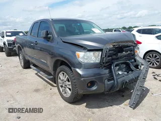 2012 Toyota Tundra with VIN 5TFRM5F19CX044180, listed as a IAAI auction lot 42499149 with 165,662 mi miles and . Bid and sale history available at DreamBid. Image 1.