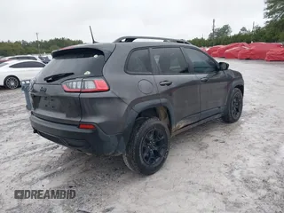 2022 Jeep Cherokee X with VIN 1C4PJMCX0ND538919, listed as a IAAI auction lot 41321416 with 65,577 mi miles. Bid and sale history available at carsss.com. Image 4.