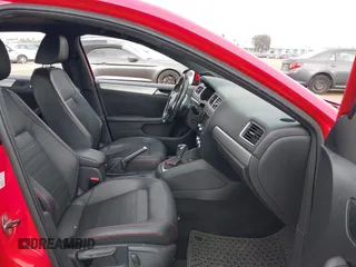 2014 Volkswagen Jetta GLI with VIN 3VW4T7AJ2EM246347, listed as a IAAI auction lot 42553341 with 140,793 mi miles and . Bid and sale history available at DreamBid. Image 5.