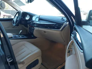 2014 BMW X5 sDrive35i z VIN 5UXKR2C52E0H33225, wystawiony jako IAAI lot #41698549 z przebiegiem 110 847 mil mil oraz . Historia ofert i sprzedaży dostępna na DreamBid. Obrazek 5.