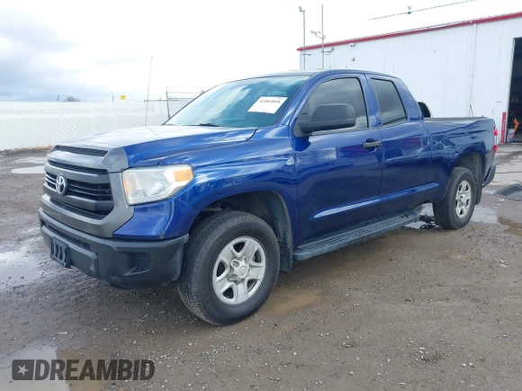 2014 Toyota Tundra SR with VIN 5TFUM5F17EX056082, listed as a IAAI auction lot 41884095 with 155,036 mi miles and . Bid and sale history available at DreamBid. Image 18.