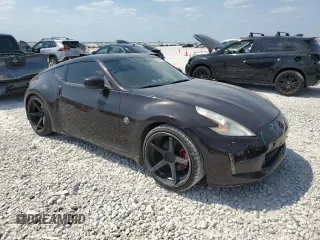 2013 Nissan 370Z Touring z VIN JN1AZ4EH0DM380992, wystawiony jako Copart lot #52194335 z przebiegiem 73 764 mil mil oraz Szkoda całkowita • Salvage title. Historia ofert i sprzedaży dostępna na DreamBid. Obrazek 4.