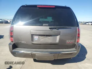 2014 GMC Yukon Denali z VIN 1GKS1EEF6ER229144, wystawiony jako Copart lot #85654154 z przebiegiem Nie podano mil oraz Szkoda całkowita • Salvage title. Historia ofert i sprzedaży dostępna na DreamBid. Obrazek 6.