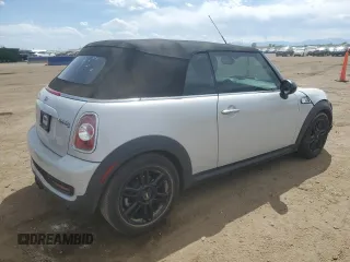 2015 MINI Convertible S z VIN WMWZP3C52FT298857, wystawiony jako Copart lot #58149145 z przebiegiem 52 777 mil mil oraz Szkoda całkowita • Salvage title. Historia ofert i sprzedaży dostępna na DreamBid. Obrazek 3.
