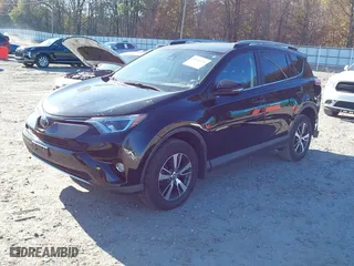 2018 Toyota RAV4 XLE with VIN 2T3RFREV9JW793956, listed as a IAAI auction lot 41012152 with 77,033 mi miles. Bid and sale history available at carsss.com. Image 18.