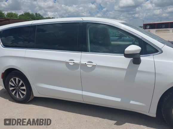 2023 Chrysler Pacifica Hybrid Touring L with VIN 2C4RC1L71PR622474, listed as a IAAI auction lot 42595061 with 55,880 mi miles and . Bid and sale history available at DreamBid. Image 13.