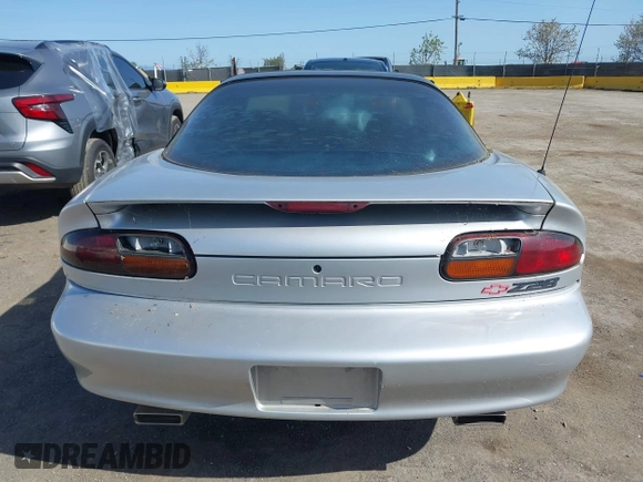 2002 Chevrolet Camaro Z28 z VIN 2G1FP22G722167574, wystawiony jako IAAI lot #41976510 z przebiegiem 114 863 mil mil oraz . Historia ofert i sprzedaży dostępna na DreamBid. Obrazek 16.