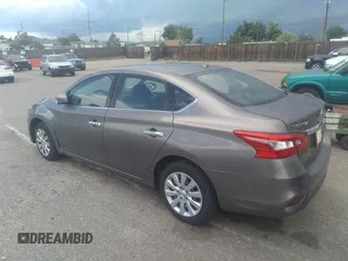 2016 Nissan Sentra S with VIN 3N1AB7AP3GL648029, listed as a IAAI auction lot 36926968 with 122,251 mi miles and . Bid and sale history available at DreamBid. Image 3.