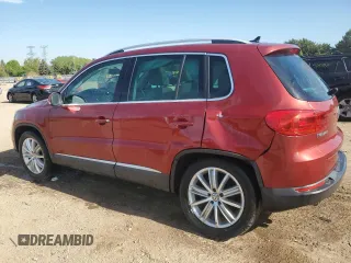 2014 Volkswagen Tiguan SE with VIN WVGAV3AX9EW038118, listed as a Copart auction lot 56329625 with 134,620 mi miles and Salvage title. Bid and sale history available at DreamBid. Image 2.