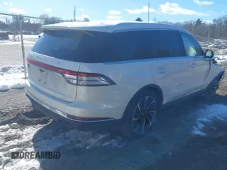 2021 Lincoln Aviator Reserve with VIN 5LM5J7XC3MGL08085, listed as a IAAI auction lot 41482512 with 61,248 mi miles and . Bid and sale history available at DreamBid. Image 4.