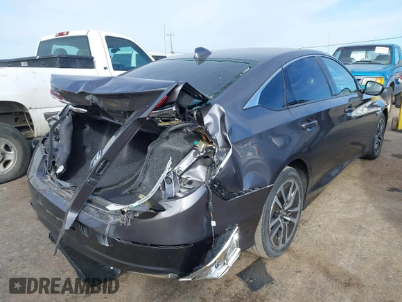 2020 Honda Accord with VIN 1HGCV3F11LA009242, listed as a IAAI auction lot 41516135 with 62,725 mi miles and . Bid and sale history available at DreamBid. Image 4.
