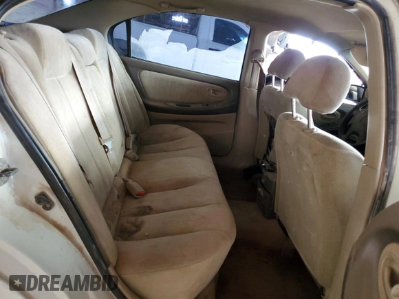 2001 Nissan Maxima GXE with VIN JN1CA31D41T809212, listed as a Copart auction lot 57845405 with 244,502 mi miles and Salvage title. Bid and sale history available at DreamBid. Image 10.