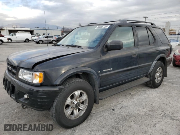 2001 Isuzu Rodeo S with VIN 4S2CK58W814333364, listed as a Copart auction lot 84656114 with 140,489 mi miles and Salvage title. Bid and sale history available at DreamBid. Image 1.