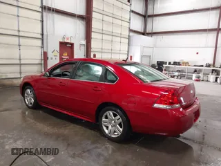 2013 Chevrolet Impala LT with VIN 2G1WG5E30D1258088, listed as a IAAI auction lot 42088699 with 145,416 mi miles and . Bid and sale history available at DreamBid. Image 3.